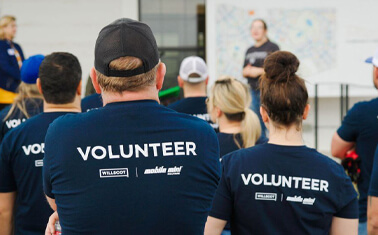 WillScot Mobile Mini employees wearing Volunteer shirts